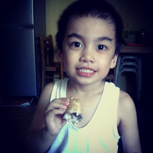 Cute! Sorry! Can't help it my little guy is just so cute eating his @cornetto upside down :)